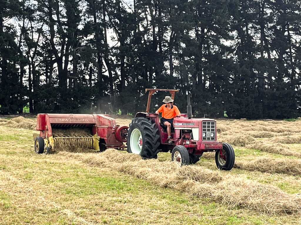 James Clark Working On Tractor